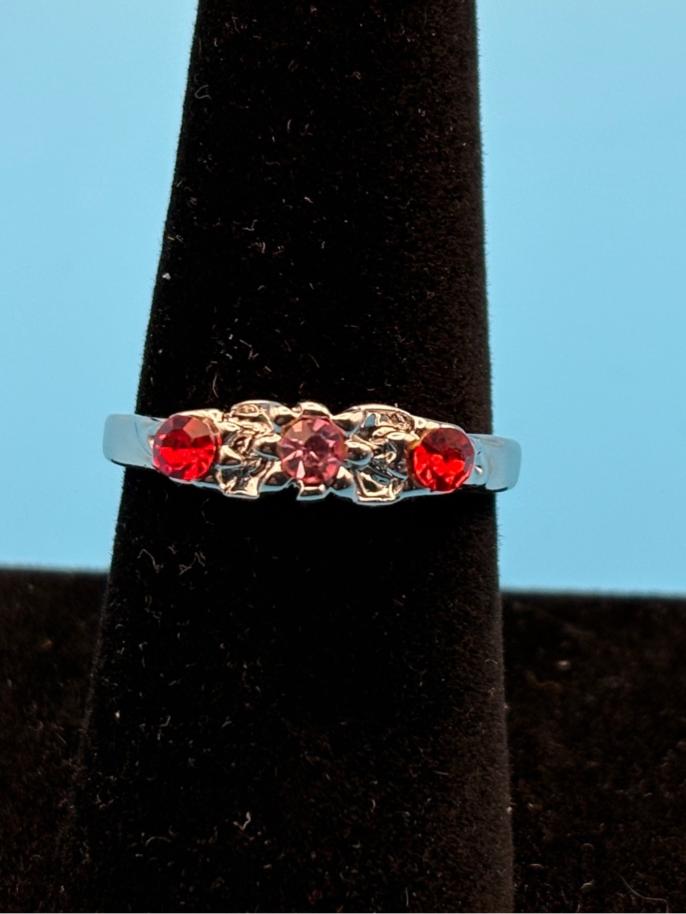 Source Unknown Ring with Pink Center and Red Accents